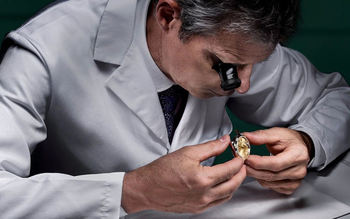 Man Inspecting Watch